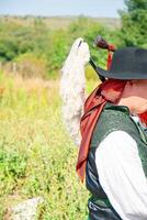 side view of a traditional bagpipe player from Galicia photo