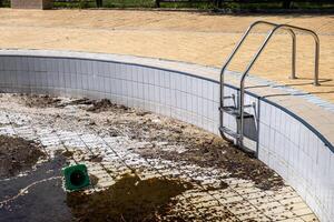 abandoned swimming pool without water photo