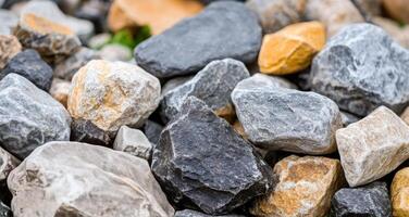 Smooth stones arranged on light surface for decorative purposes photo