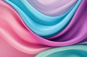 Soft, colorful silk fabric draping gracefully in a wave pattern under soft lighting photo