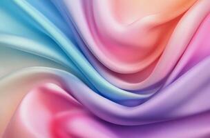 Soft, colorful silk fabric draping gracefully in a wave pattern under soft lighting photo