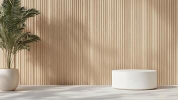 Simple decor featuring a round table with a vase and blossoming branch against a wooden wall photo