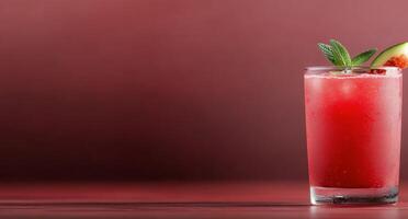 Refreshing tomato-based drink with celery garnish on a vibrant red background photo