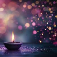 Illuminated Candle on Table With Bokeh Effect at Night photo