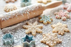 Baking Star-Shaped Cookies With Rolling Pin and Flour on Wooden Surface photo