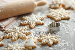 Baking Star-Shaped Cookies With Rolling Pin and Flour on Wooden Surface photo