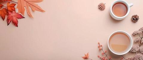 Autumn Leaves Surrounding a Cup of Tea on a Beige Surface photo