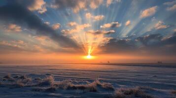 Majestic Sunrise Over Snow-Covered Field in Winter Landscape photo