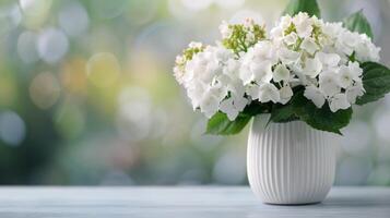 Elegant White Hydrangea Arrangement in a Ribbed Vase on a Bright Sunny Day photo