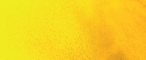 Abstract orange golden bubble foam background. Distribution of bubbles. Nice 3d spheres with reflection. Macro shot of various air bubbles in water. Photography photo