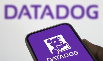 Dhaka, Bangladesh, 11 Aug 2024- DataDog logo is displayed on smartphone. Datadog is a SaaS platform that monitors cloud applications. photo