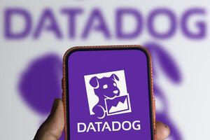 Dhaka, Bangladesh, 11 Aug 2024- DataDog logo is displayed on smartphone. Datadog is a SaaS platform that monitors cloud applications. photo