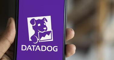 Dhaka, Bangladesh, 11 Aug 2024- DataDog logo is displayed on smartphone. Datadog is a SaaS platform that monitors cloud applications. photo