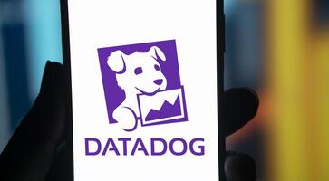 Dhaka, Bangladesh, 11 Aug 2024- DataDog logo is displayed on smartphone. Datadog is a SaaS platform that monitors cloud applications. photo