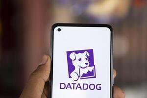 Dhaka, Bangladesh, 11 Aug 2024- DataDog logo is displayed on smartphone. Datadog is a SaaS platform that monitors cloud applications. photo