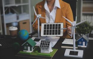 Carbon offset price report CO2 emission. Future growth Net zero waste in ESG ethical SME office protect climate change global warming social issues project. Group of asia people Eco friendly SDGs plan photo
