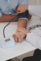 The doctor woman hand use the pulse meter to measure the pressure of the patient, medical checkup concept. photo