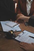 concept of justice and law A male judge in the courtroom on a wooden table and a male counselor or lawyer working in the office. Law, advice and justice concepts. photo
