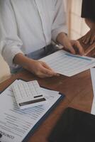 Business meetings to analyze investment strategies and brainstorm sales plans for a more profitable business. photo