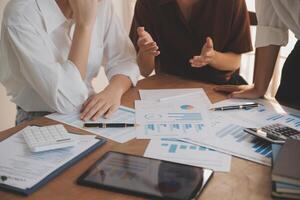 Business meetings to analyze investment strategies and brainstorm sales plans for a more profitable business. photo