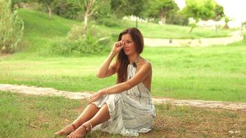 Face Yoga Expert shows an exercise to reduce interbrow wrinkles in nature 1 video