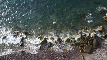 footage of the coast from a height, high view angle footage, drone footage in a beach, high view angle a sea, 4K , 60 fps video