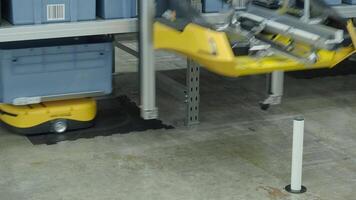 Demonstration of Smart warehouse management system with robotic handling system. Automated robotic tote arranging distribution product stock on shelf in modern factory. AI Technology Logistic concept. video