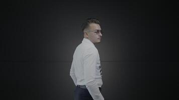 Profile View of a Professional in a Dark Studio Setting video