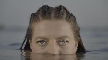 Intense look above the water surface is captivating and profound video