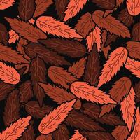 a pattern of red and orange leaves on a black background vector
