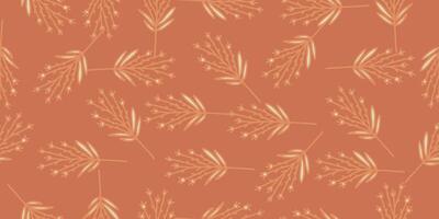 a pattern of leaves on an orange background vector