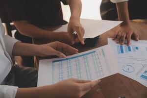 Business meetings to analyze investment strategies and brainstorm sales plans for a more profitable business. photo