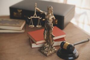 Lawyer, legal advisor, businessman brainstorming information on agreement details Business contracts in legal processing books for accuracy in contract documents. joint financial investment. photo