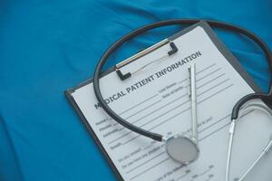 In a hospital setting, the presence of a doctor's physician book and stethoscope carries with it an air of professionalism and dedication to patient care. photo