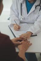 Female doctors shake hands with patients encouraging each other To offer love, concern, and encouragement while checking the patient's health. Concept Health care and Social Security photo