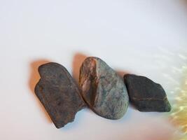 Stones on white background for display area photo