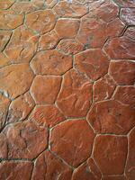 Close-up of cement walkway texture for home background. photo