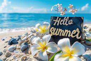 Hello summer sign on sandy beach with shells and flowers under blue sky photo