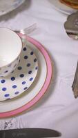 Polka Dot Teacup and Saucer on Elegant Table Setting video