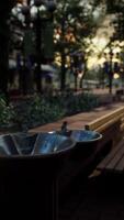 closeup of a drinking water fountain in a park on sunset video