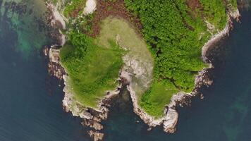 View from a drone vertically down on the rocks of Cape Kuzmin video