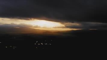 A view from a drone of a beautiful sunset in the valleys with the river video