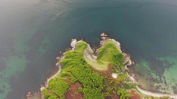 View from a drone vertically down on the rocks of Cape Kuzmin video