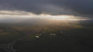 A view from a drone of a beautiful sunset in the valleys with the river video
