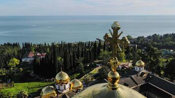Beautiful monastery with golden domes captured by drone video