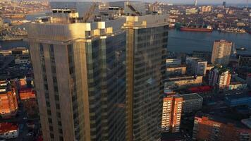 Drone view of a modern skyscraper located in the center of Vladivostok video