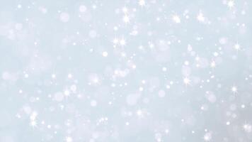 Beautiful fairytale magic shimmering glitter particles of light dots and stars in a cartoon style. Beautiful bokeh on a light background. seamless loop. video