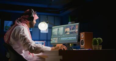Multimedia editor working on cinematographic project, creating editing montage, cutting, stitching and removing artefacts on images. Employee doing color grading on PC workstation photo