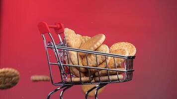 shopping grocery cart, trolley is completely filled with cookies and rotates video