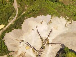 Bird eye view of sand mining conveyor from a height of 200 meters. Mining Industry. Panoramic Landscape. Graphic Resources. Above. Drone Photography. Aerial Landscape Photography Concept photo